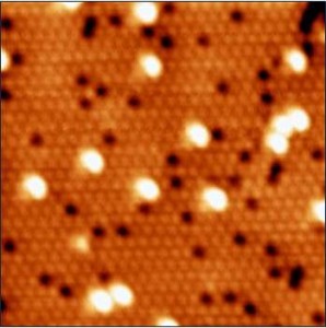 Single Au atoms on a defective V2O3 film.